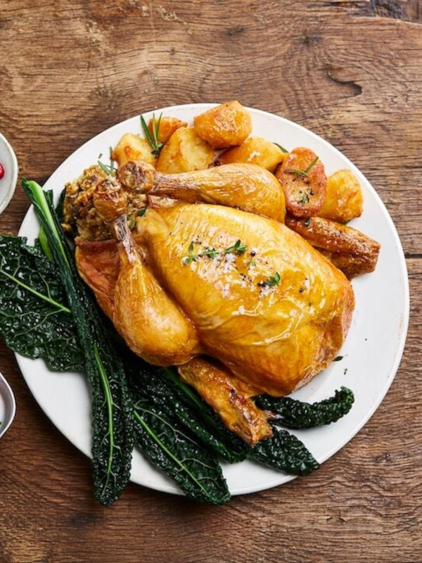 Chicken with sage & rosemary stuffing, buttered cavolo nero & rosemary